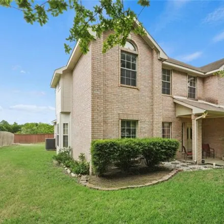 Rent this 4 bed house on 1300 Neches Place in Lancaster, TX 75146