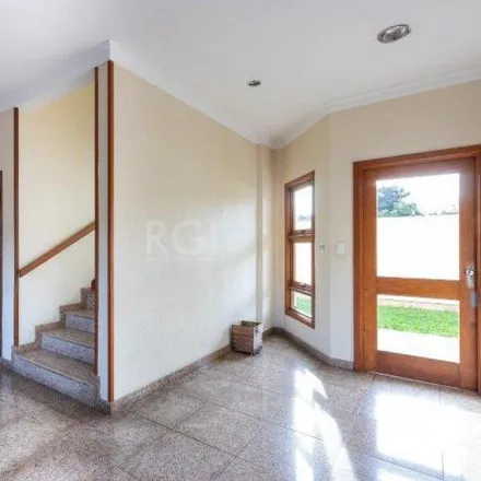 Buy this 4 bed apartment on unnamed road in Camaquã, Porto Alegre - RS