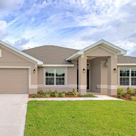 Buy this 4 bed house on 577 Saragossa Avenue in Palm Bay, FL 32908