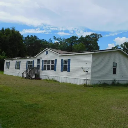 Buy this 4 bed house on 7928 Southwest 76th Street in Gilchrist County, FL 32693