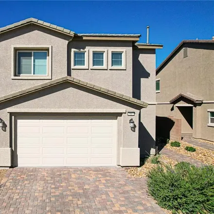 Buy this 4 bed townhouse on Fossil Rim Street in North Las Vegas, NV 89084