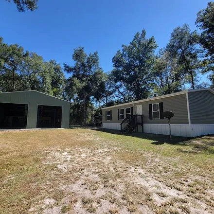 Buy this 3 bed loft on 11787 Northwest 73 Court in Levy County, FL 32626