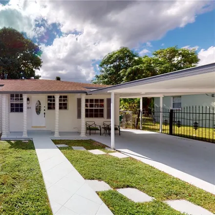 Buy this 4 bed house on 1084 Northwest 58th Terrace in Liberty Square, Miami