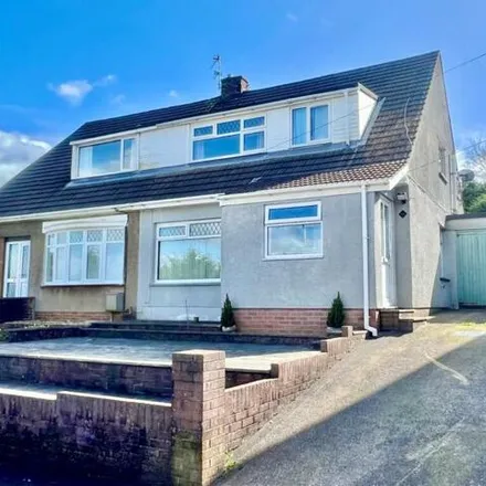 Buy this 4 bed duplex on Treharne Drive in Pen-y-fai, CF31 4NT
