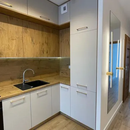 Rent this 3 bed apartment on Stanisława Lema in 31-572 Krakow, Poland