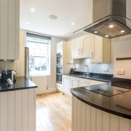 Rent this 4 bed townhouse on 27 Agamemnon Road in London, NW6 1DY