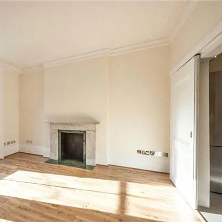 Rent this 5 bed townhouse on 45 Brunswick Gardens in London, W8 4AN