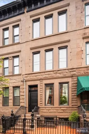 Buy this 5 bed townhouse on 1211 Park Avenue in Hoboken, NJ 07030