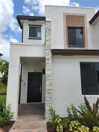 Rent this 3 bed townhouse on 190 Northeast 211th Street in Andover Lakes Estates, Miami Gardens