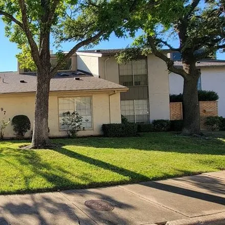 Buy this 3 bed townhouse on 9701 Smokefeather Lane in Dallas, TX 75243