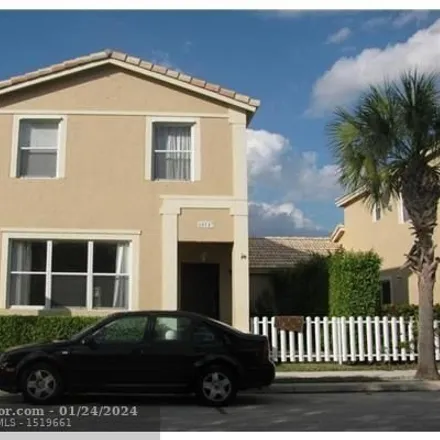 Rent this 3 bed house on 10559 Northwest 57th Street in Kensington Manor, Coral Springs