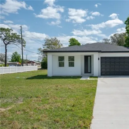 Buy this 4 bed house on 631 East Washington Avenue in Eustis, FL 32726