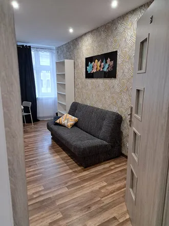 Rent this 6 bed room on Święty Marcin 76 in 61-809 Poznań, Poland