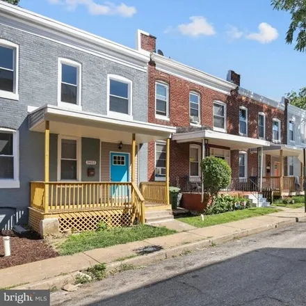 Rent this 3 bed townhouse on 3451 Cottage Avenue in Baltimore, MD 21215