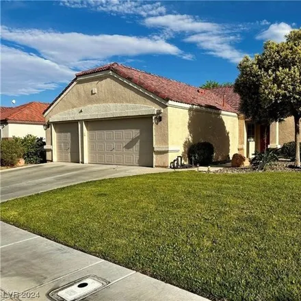 Buy this 3 bed house on 2715 Gardenia Flower Avenue in North Las Vegas, NV 89031