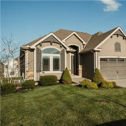 Buy this 4 bed house on 4101 Northeast Timber Lake Drive in Lee's Summit, MO 64064