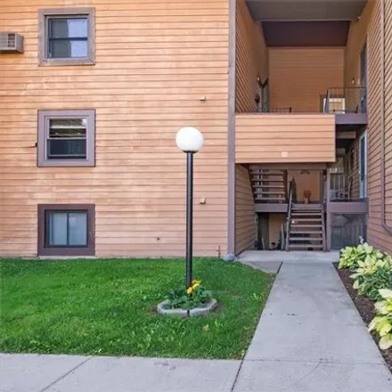 Rent this 2 bed condo on 557 Village Boulevard North in Village Green, Onondaga County