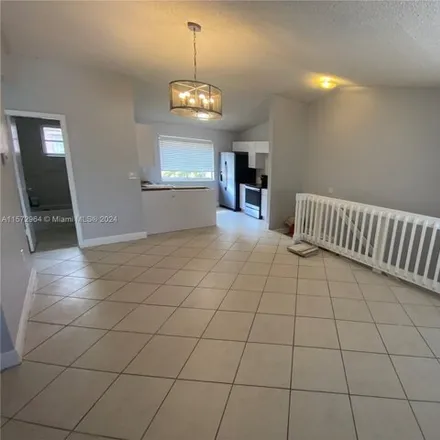 Rent this 2 bed townhouse on 8019 Lake Drive in Doral, FL 33166