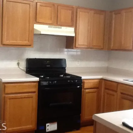 Rent this 3 bed apartment on 10861 Knotty Pine Place in Bonanza, Clayton County