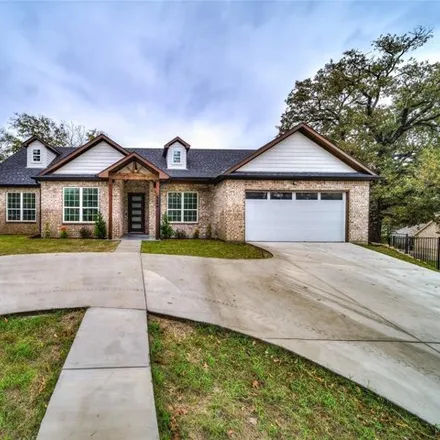 Buy this 4 bed house on 6904 Quarteroaks Drive in Tarrant County, TX 76020