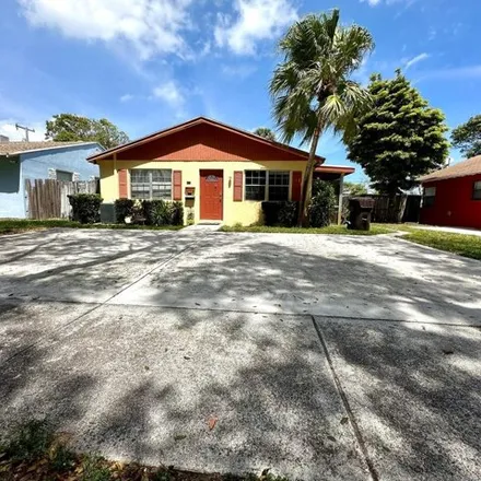 Rent this 2 bed apartment on 431 55th Street in West Palm Beach, FL 33407