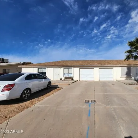 Buy this studio house on 15856 S Moon Valley Rd in Arizona City, Arizona
