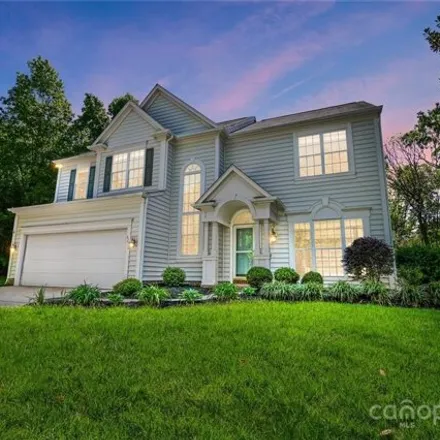 Buy this 4 bed house on 6212 Downfield Wood Drive in Charlotte, NC 28269