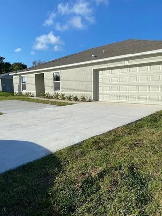 Rent this 4 bed house on 2231 Southeast Mariposa Avenue in Port Saint Lucie, FL 34952