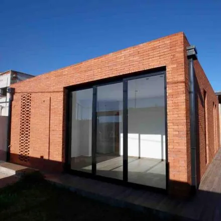 Buy this 3 bed house on Calle 467 in Partido de La Plata, 1896 City Bell
