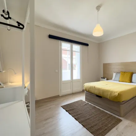 Rent this 6 bed room on Carrer de Verdi in 08001 Barcelona, Spain