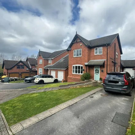 Buy this 4 bed house on Grange Park Drive in Churwell, LS27 7UR