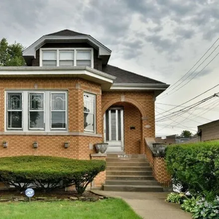 Buy this 4 bed house on 5345 West Wolfram Street in Chicago, IL 60641