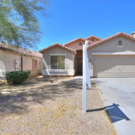 Buy this 4 bed house on 45532 West Tulip Lane in Maricopa, AZ 85139