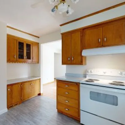 Rent this 3 bed apartment on 5012 Bryant Avenue North in Lind - Bohanon, Minneapolis