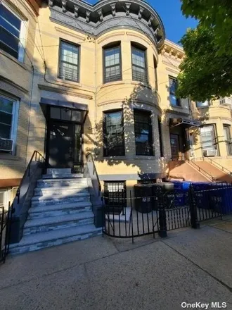 Buy this 7 bed townhouse on 72-41 61st Street in New York, NY 11385