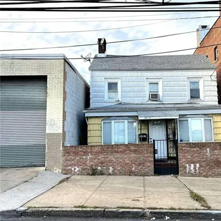 Buy this 4 bed house on 150-15 12th Road in New York, NY 11357