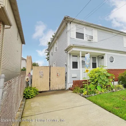 Buy this 3 bed house on 61 Alberta Avenue in New York, NY 10314