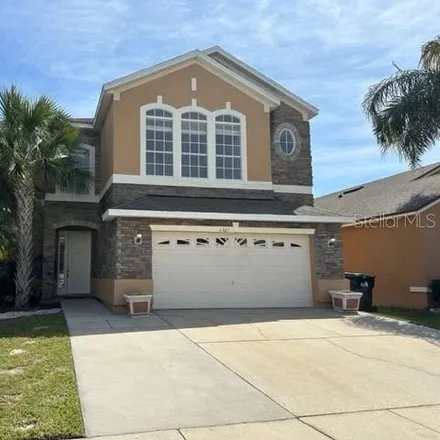 Rent this 4 bed house on 1355 Darnaby Way in Meadow Woods, Orange County
