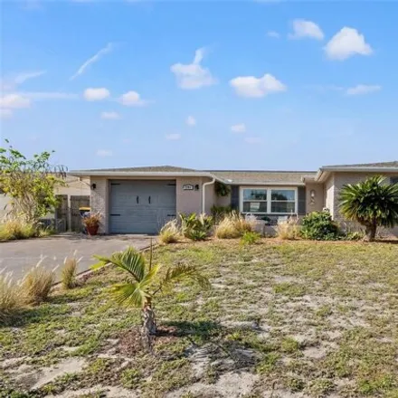 Buy this 2 bed house on 7799 Ilex Drive in Bayonet Point, FL 34668