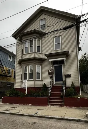Buy this 7 bed townhouse on 128 Penn Street in Olneyville, Providence