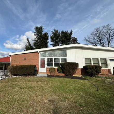 Buy this 4 bed house on 8138 Scotts Level Road in Pikesville, MD 21208