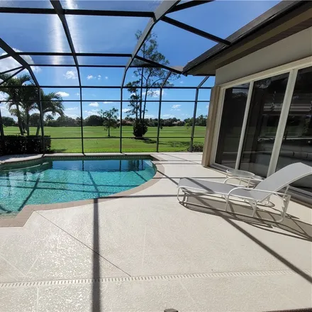 Rent this 3 bed house on 6046 Dogleg Drive in Lely Resort, Lely
