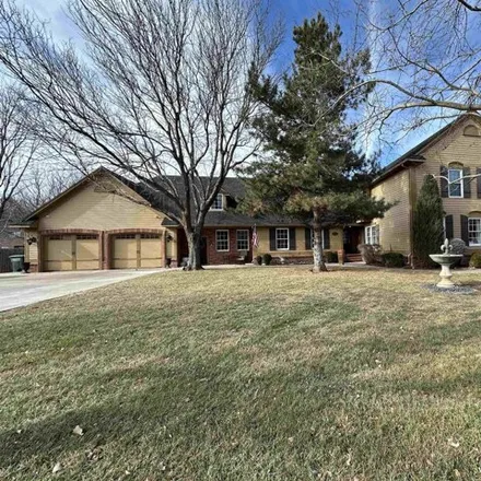 Buy this 4 bed house on 2035 Windsong Way in Dodge City, KS 67801