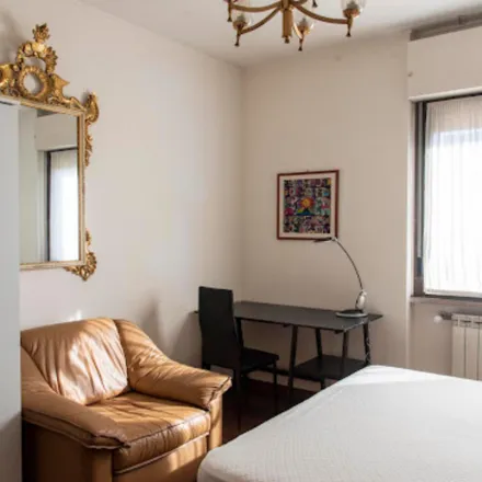 Rent this 4 bed room on Carrefour Express in Viale Cesare Pavese, 284