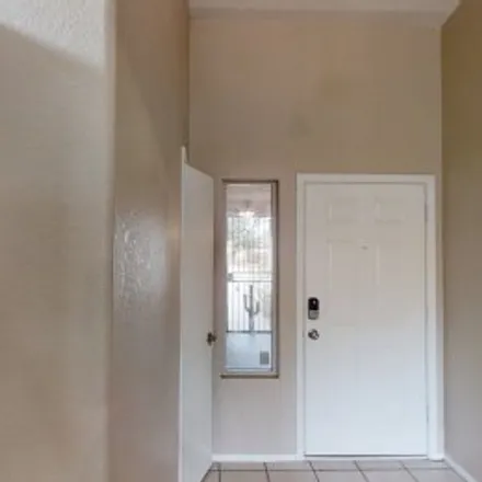 Rent this 4 bed apartment on 7617 South Freshwater Pearl Drive in Rita Ranch, Tucson