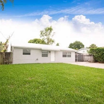 Rent this 3 bed house on 1787 Wheeler Road in Juno Ridge, Palm Beach County