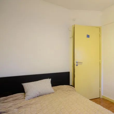 Rent this 4 bed room on Rua Cidade da Praia LT 367 in 1800-119 Lisbon, Portugal
