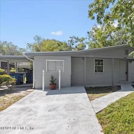 Rent this 4 bed house on 10591 Airport Ter Drive in Jacksonville, FL 32225