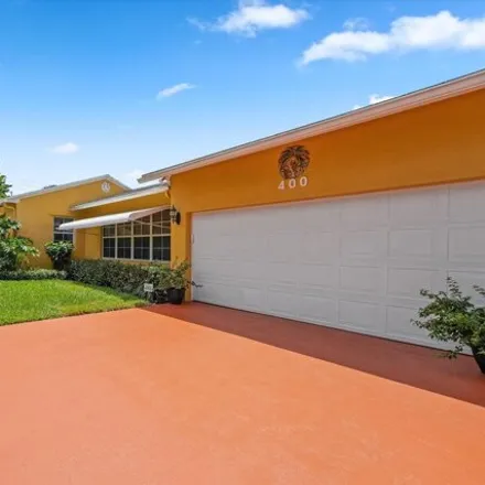 Buy this 3 bed house on 408 35th Street in West Palm Beach, FL 33407