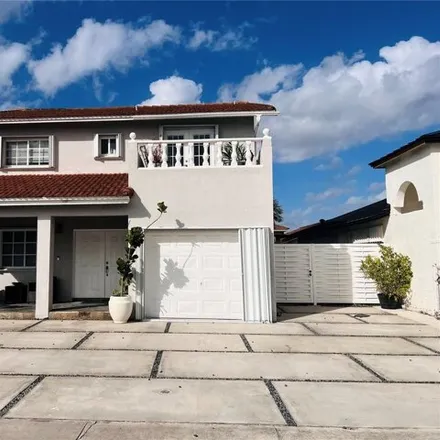 Rent this 3 bed house on 12374 Northwest 98th Place in Hialeah Gardens, FL 33018